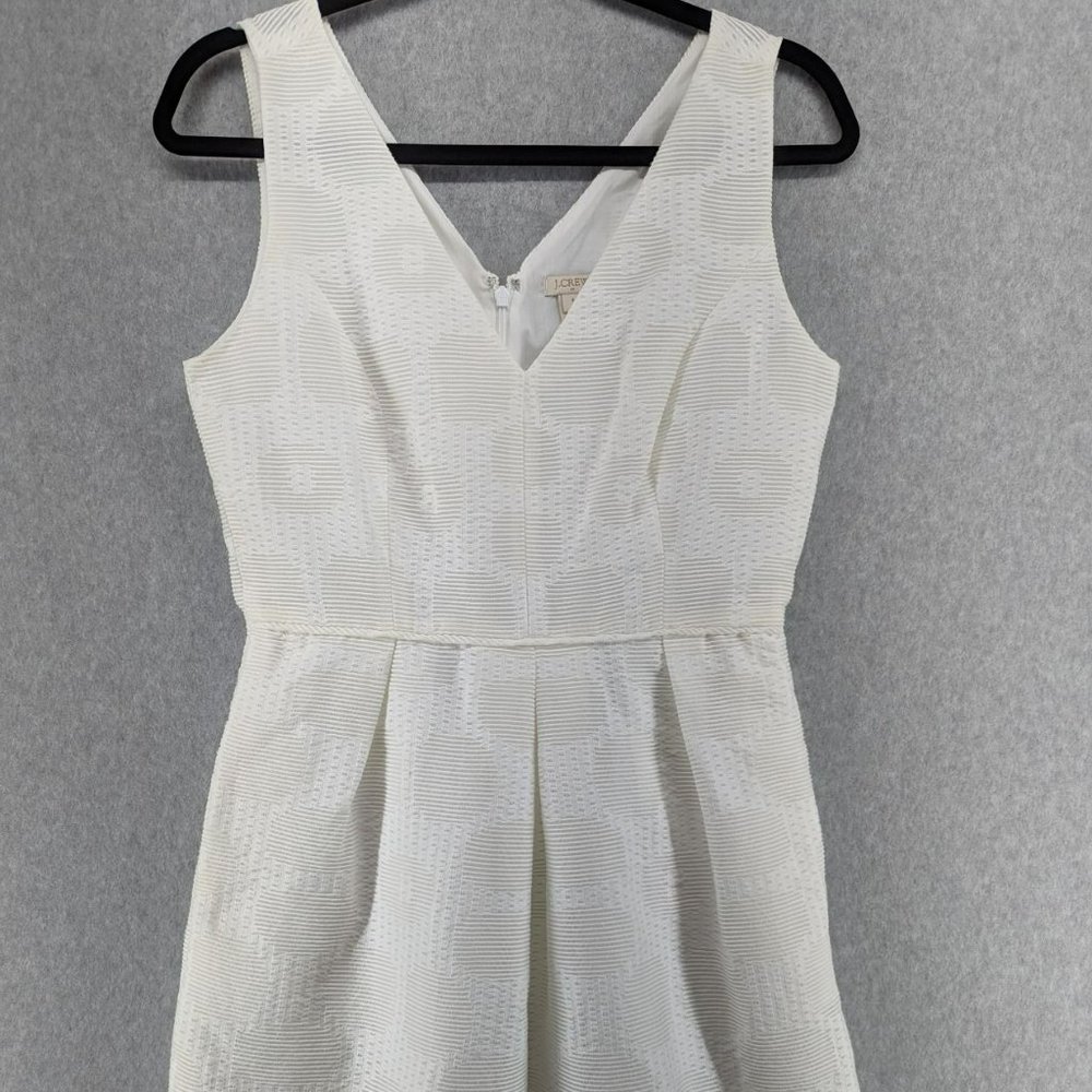 J. Crew white knitโ sleeveless dress with circle designs and pockets